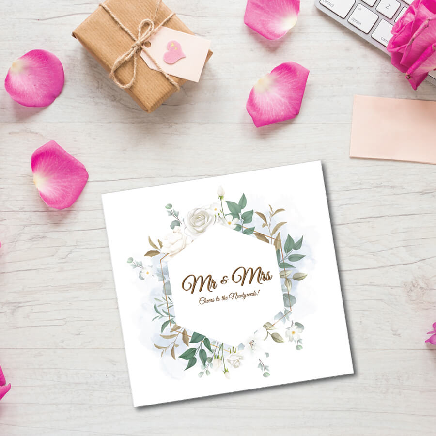 Cheers to the newlyweds greeting card