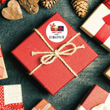 Do Not Open Until Christmas sticker on gift wrapping